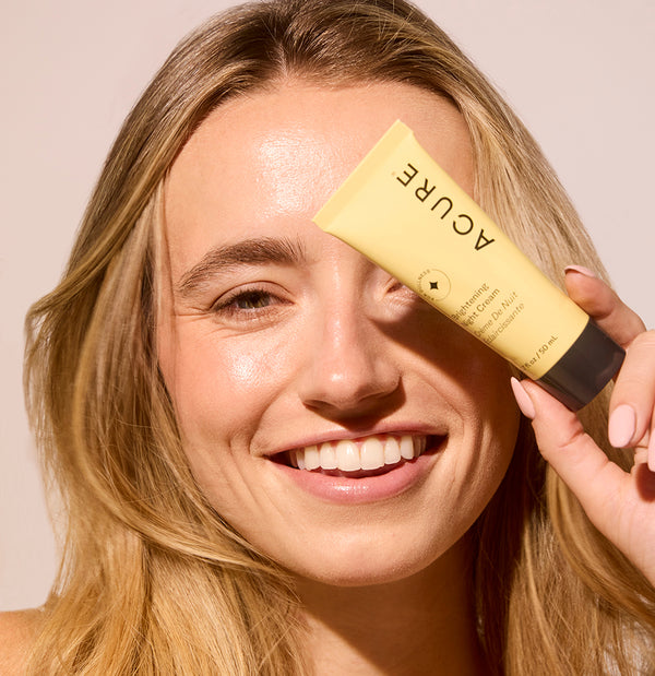 Acure Brightening Night Cream with model