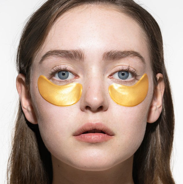 ACURE under eye hydrogels packaging on a light background