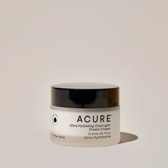 Acure Ultra Hydrating Overnight Cream jar on a beige background